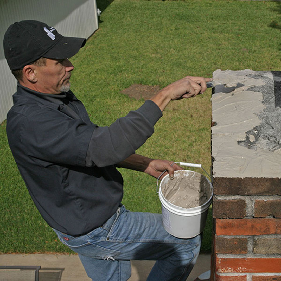 cracks in your chimney crown in Woodlands TX